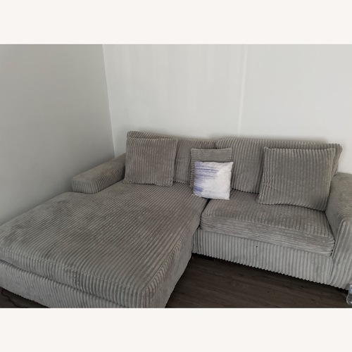 Used Ashley Furniture Light Gray 2 Piece Sectional for sale on AptDeco