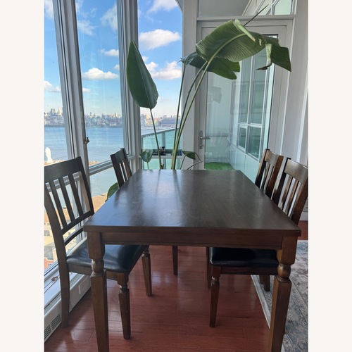 Used Alston Quality Industries Dark Brown Dining Table for sale on AptDeco