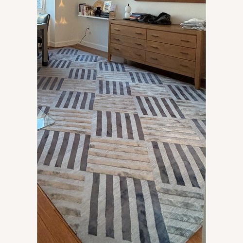 Used Stark Blue and Gray Striped Rug for sale on AptDeco