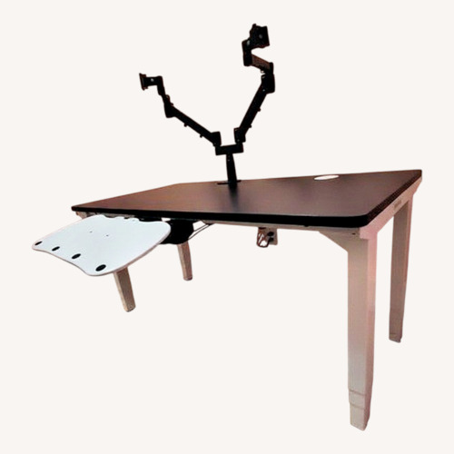 Used Uplift V2 4-Leg Standing Desk W Dual Monitor Arm for sale on AptDeco