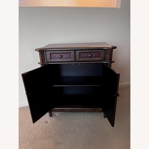 Used Vintage/Antique Floral Dark Brown Wood Sideboard for sale on AptDeco