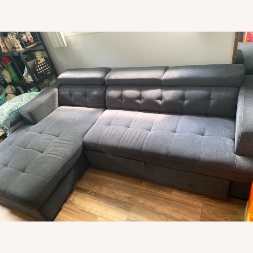 Used Playpen Sectional W Hideaway Bed & Storage for sale on AptDeco