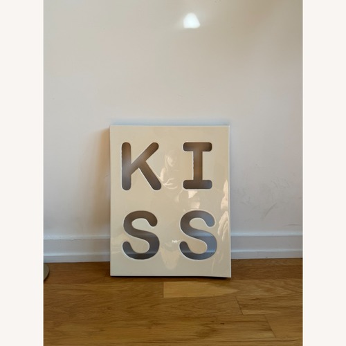 Used Andy Blank “KISS” Sculptural Wall Art in White for sale on AptDeco