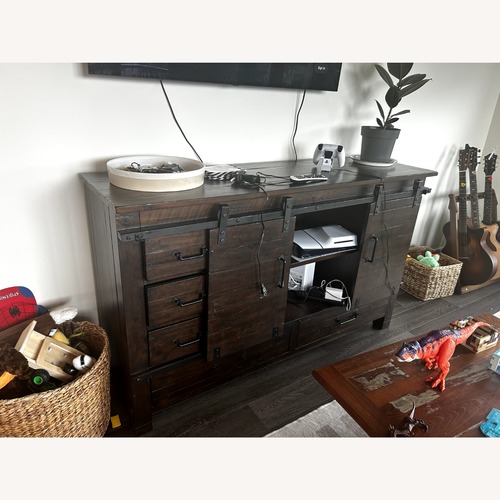 Used Furniture Row Dark Brown Wood Dresser for sale on AptDeco