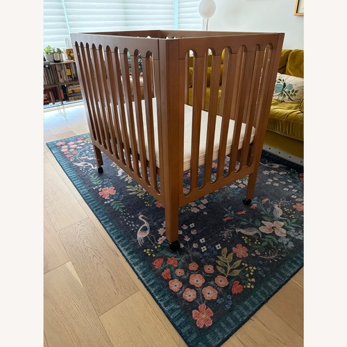 Used Newton Galileo Chestnut Minicrib for sale on AptDeco