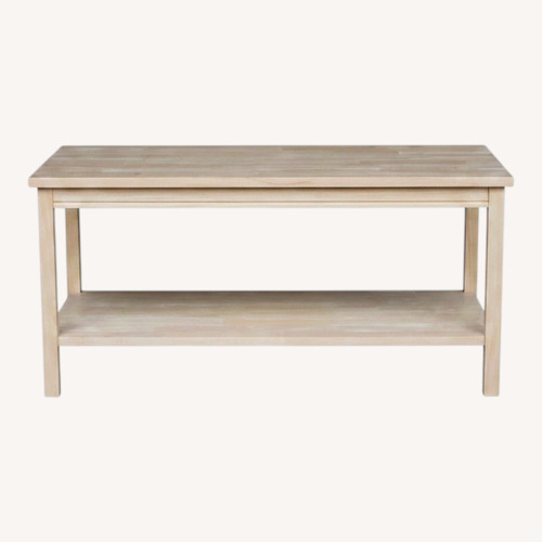 Used Overstock Natural Wood Coffee Table for sale on AptDeco