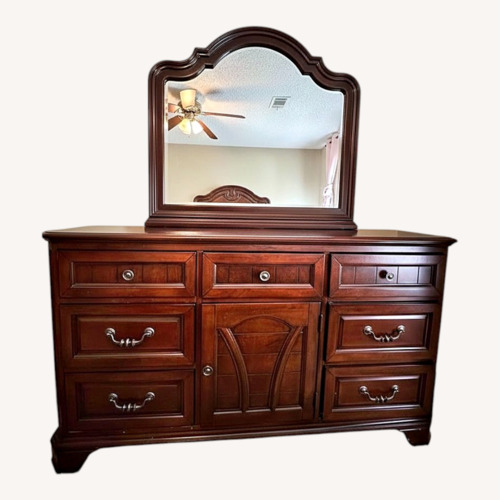 Used Rooms To Go Dark Brown Wood Dresser for sale on AptDeco