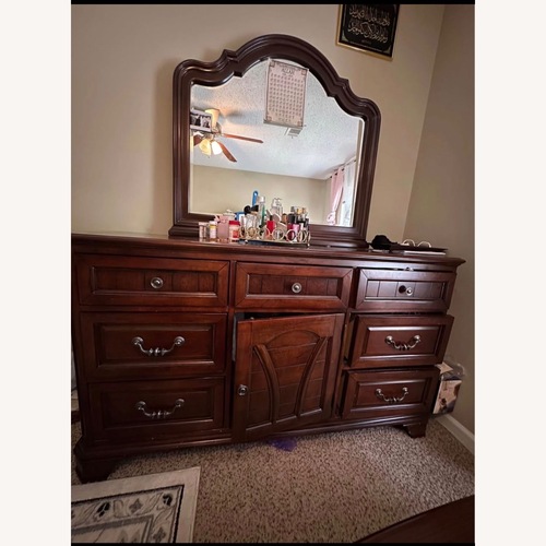 Used Rooms To Go Dark Brown Wood Dresser for sale on AptDeco