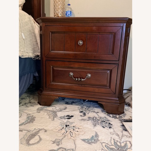 Used Rooms To Go Dark Brown Wood Nightstands for sale on AptDeco