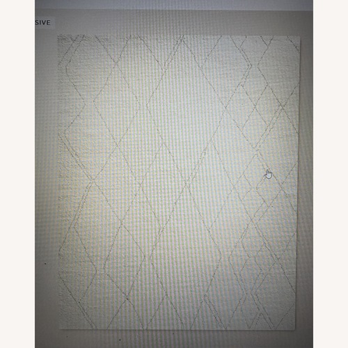 Used CB2 Natural Wool Area Rug 6' x 9' for sale on AptDeco