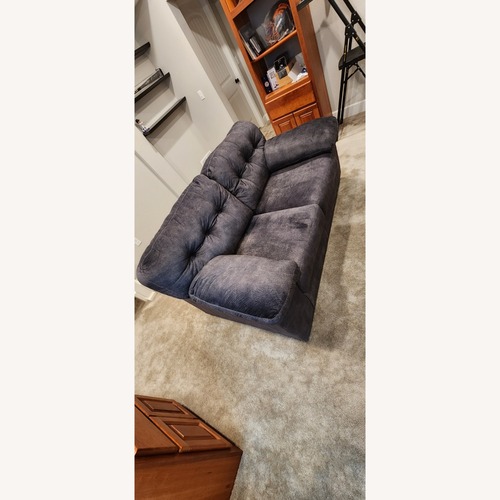 Used Ashley Dark Blue Loveseat for sale on AptDeco