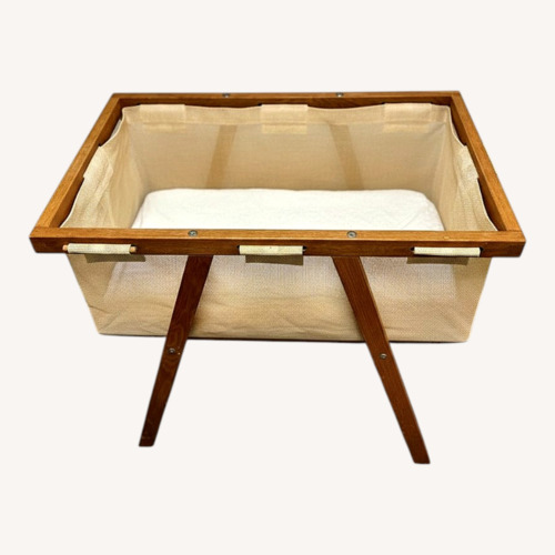 Used Seimi Natural Wood Bassinet for sale on AptDeco