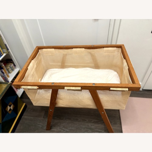 Used Seimi Natural Wood Bassinet for sale on AptDeco