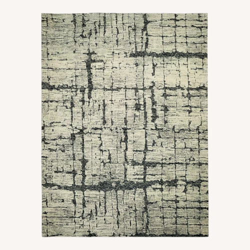 Used West Elm Birch Light Gray Wool Area Rug 6' x 9' for sale on AptDeco