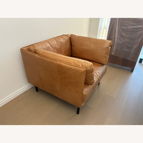 Used West Elm Orange Leather Accent Chair for sale on AptDeco