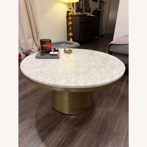 Used West Elm Marble Topped Pedestal Coffee Table (30.5") for sale on AptDeco