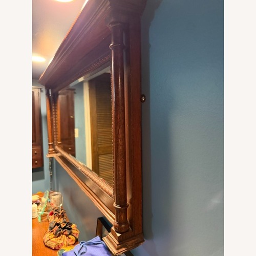 Used Vintage/Antique Dark Brown Wood Wall Mirror for sale on AptDeco