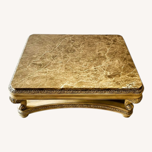 Used Champagne Marble Top Coffee Table for sale on AptDeco