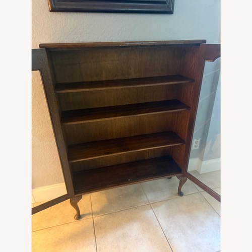 Used Antique Wood Curio Cabinet for sale on AptDeco