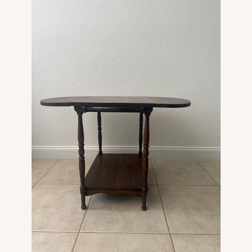 Used Vintage/Antique Finds Dark Brown Wood Side Table for sale on AptDeco