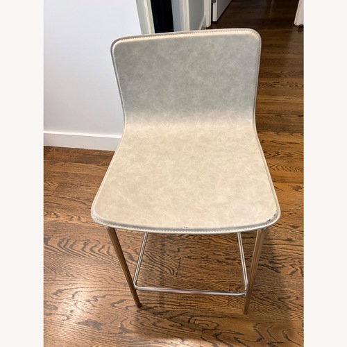 Used CB2 Strut Light Gray Vinyl Stool for sale on AptDeco