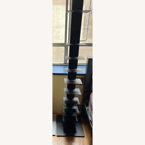 Used Container Store Floating Black Metal Bookcase for sale on AptDeco