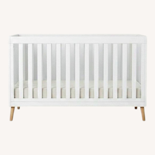 Used Delta Children White Wood Crib for sale on AptDeco