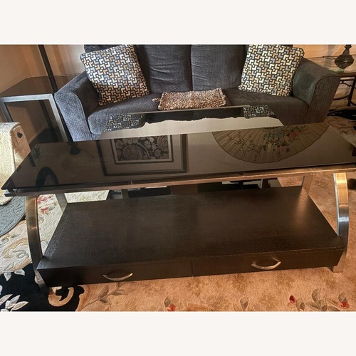 Used Black Glass Media Storage for sale on AptDeco