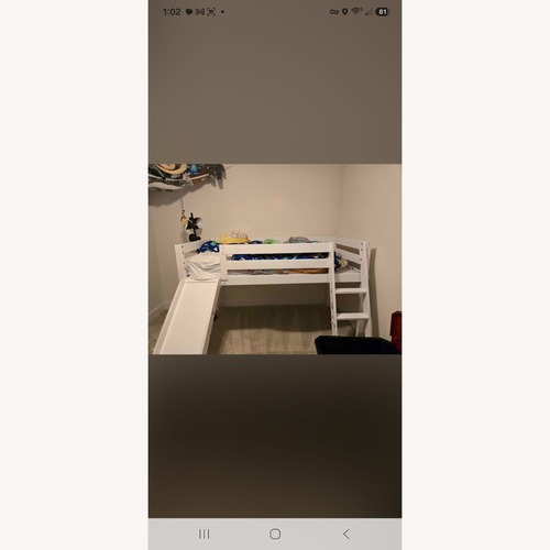 Used White Low Loft Bed With a Slide and Ladder for sale on AptDeco