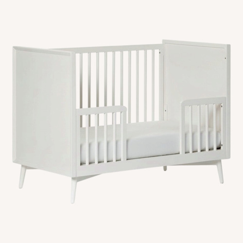 Used Pottery Barn Kids Mid-Century White Wood Crib for sale on AptDeco