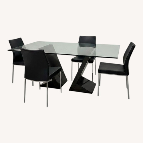 Used Large Glass DIning Table and Chairs for sale on AptDeco
