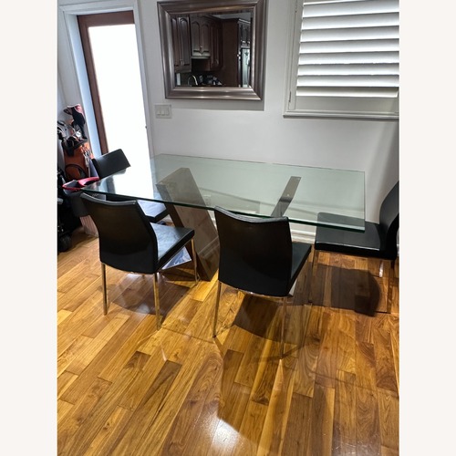 Used Large Glass DIning Table and Chairs for sale on AptDeco