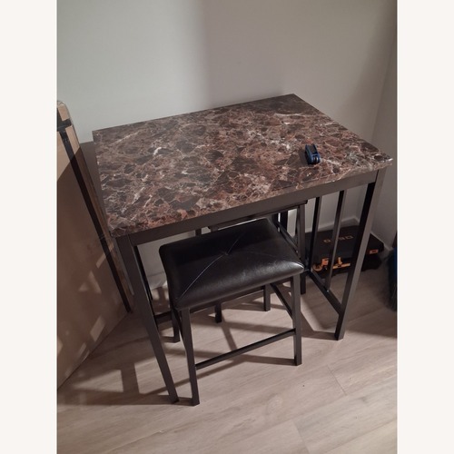 Used Dark Brown Marble Dining Set for sale on AptDeco