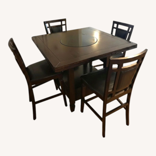 Used Raymour & Flanigan Northfield Dining Table W Lazy Susan for sale on AptDeco