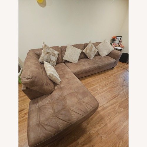Used Bob's Discount Furniture Sierra Cognac 118” 2-Piece Chaise Sectional for sale on AptDeco
