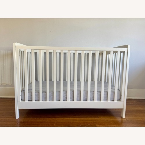 Used The Land of Nod White Wood Crib for sale on AptDeco