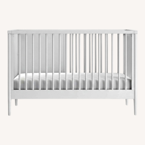 Used The Land of Nod White Wood Crib for sale on AptDeco