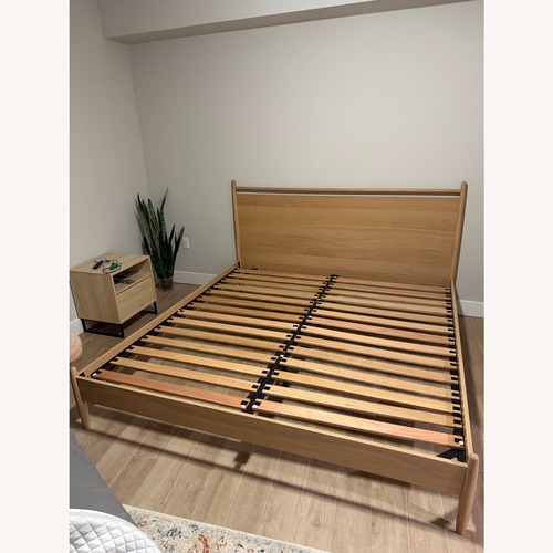 Used Article Lenia Natural Wood King Bed for sale on AptDeco