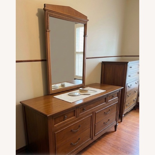 Used Vintage/Antique Finds Light Brown Wood Dresser for sale on AptDeco
