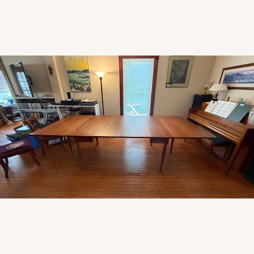 Used KrausUSA Light Brown Wood Dining Table for sale on AptDeco