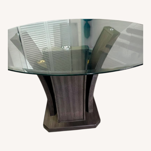 Used Transparent Glass Dining Table for sale on AptDeco