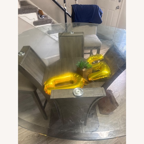 Used Transparent Glass Dining Table for sale on AptDeco
