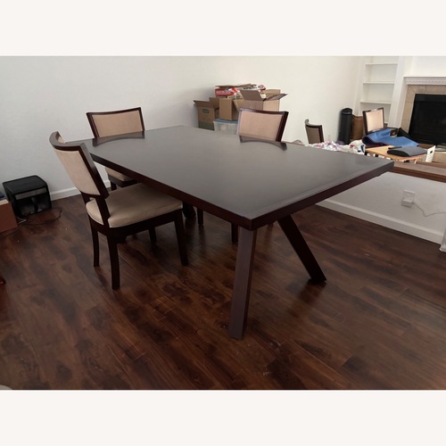 Used Scandinavian Designs Dark Cherry Wood Table & 6 Chairs for sale on AptDeco