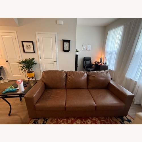 Used Ashley Bolsena Queen Leather Sleeper Sofa for sale on AptDeco