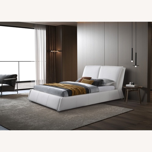 Used White Faux Leather Designer Queen Bed for sale on AptDeco