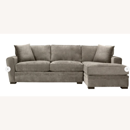 Used Raymour & Flanigan Sleeper Sectional & Ottoman for sale on AptDeco