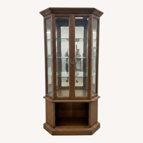 Used Lighted Glass Curio Cabinet Wood Display Case for sale on AptDeco