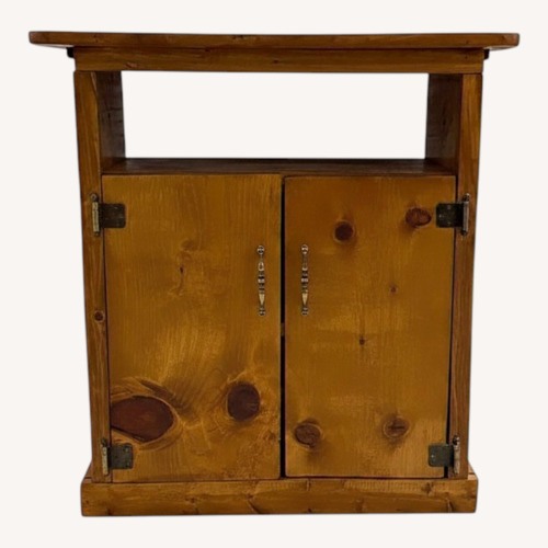 Used Rustic Knotty Pine Accent Cabinet With Shelf for sale on AptDeco