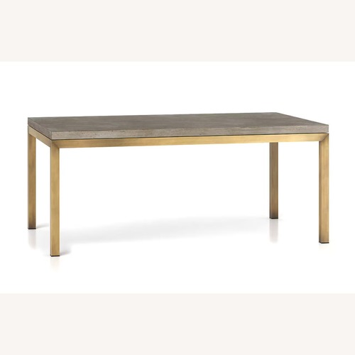 Used Crate & Barrel Parsons Concrete and Brass Dining Table for sale on AptDeco