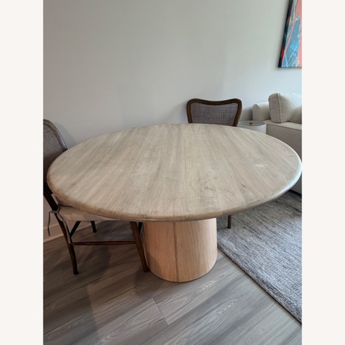 Used West Elm Natural Wood Round Dining Table for sale on AptDeco